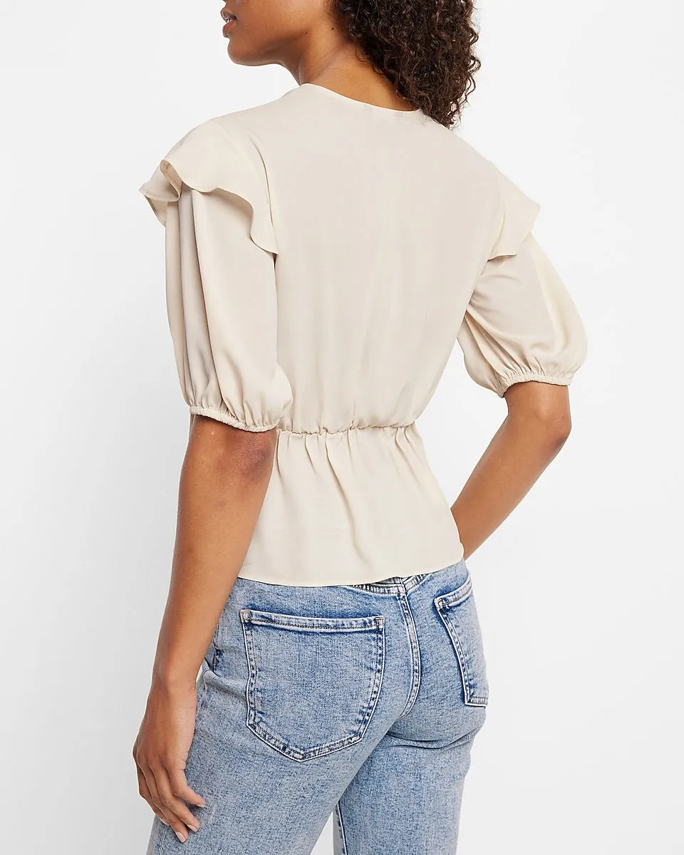 Conscious Edit Faux Wrap Puff Sleeve Peplum Top in Sandshell